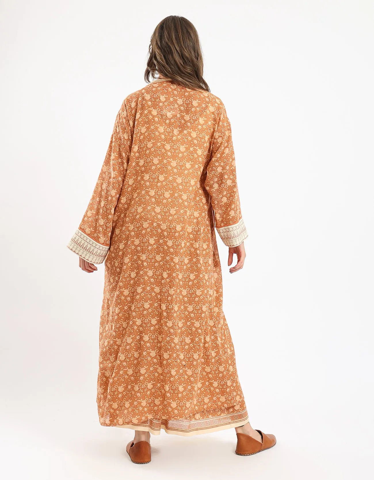 Long printed coat with embroidery on cuffs